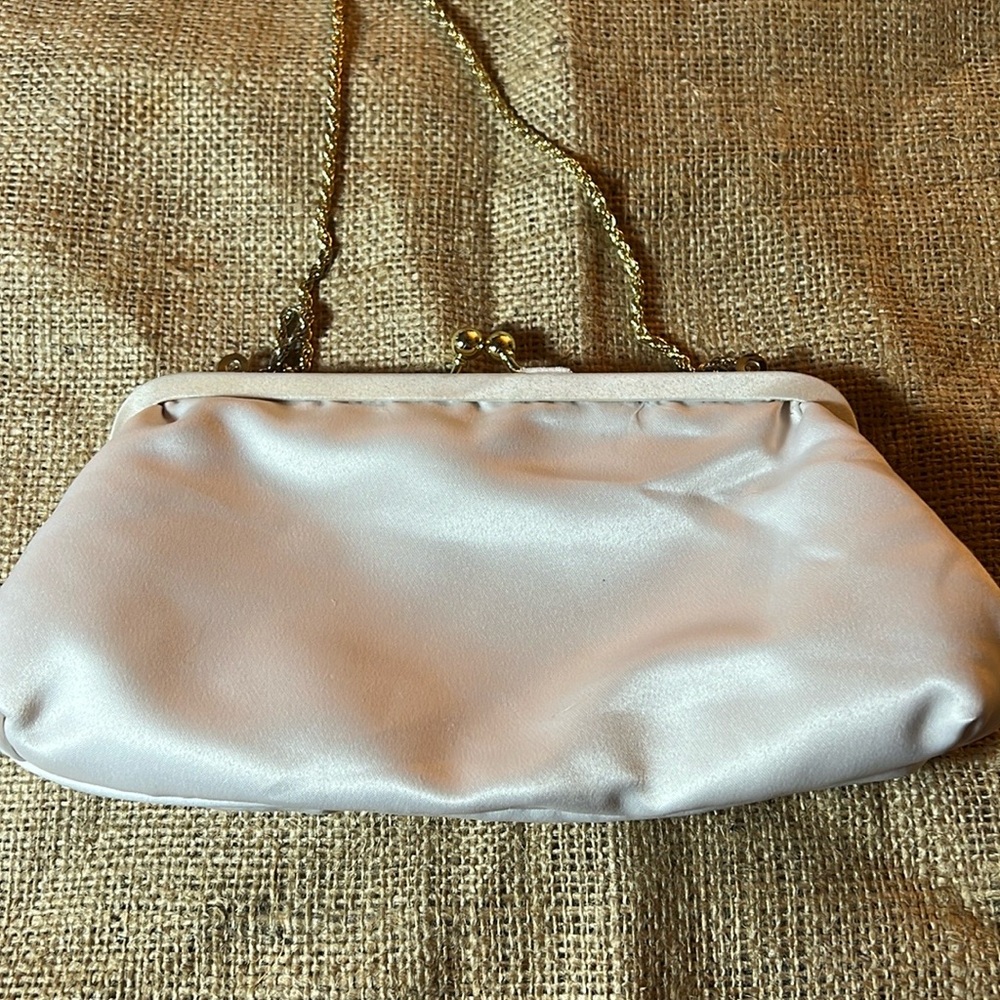 Beige evening clutch with gold chain .  Gold ball snaps work perfect